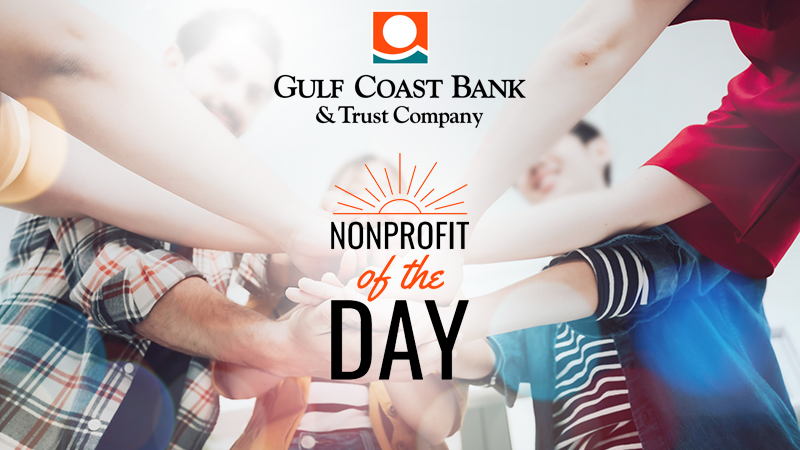 team with hands in and Gulf Coast bank and Trust Co logo