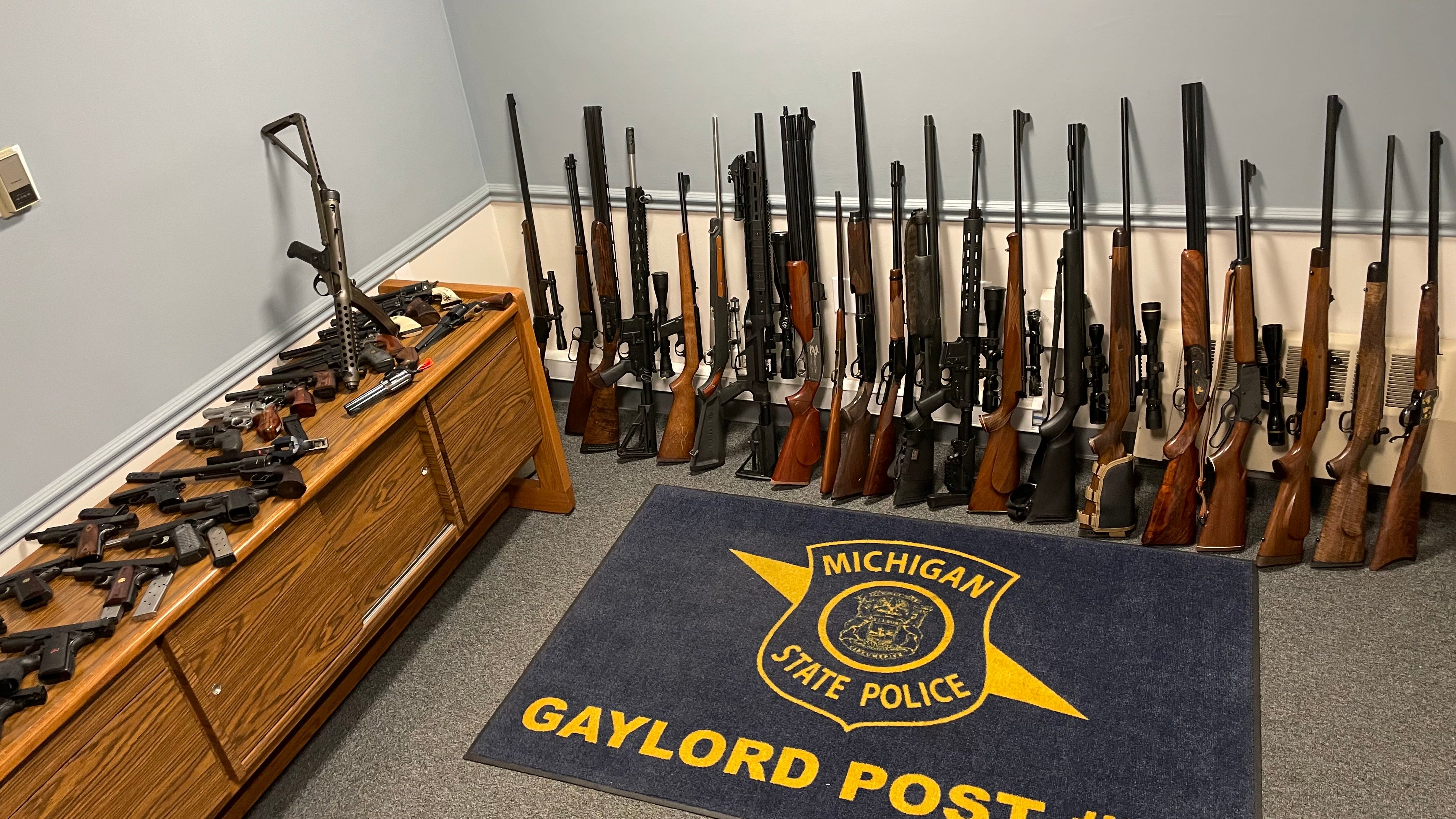 Northern Michigan man arrested after police find over 50 guns at his house
