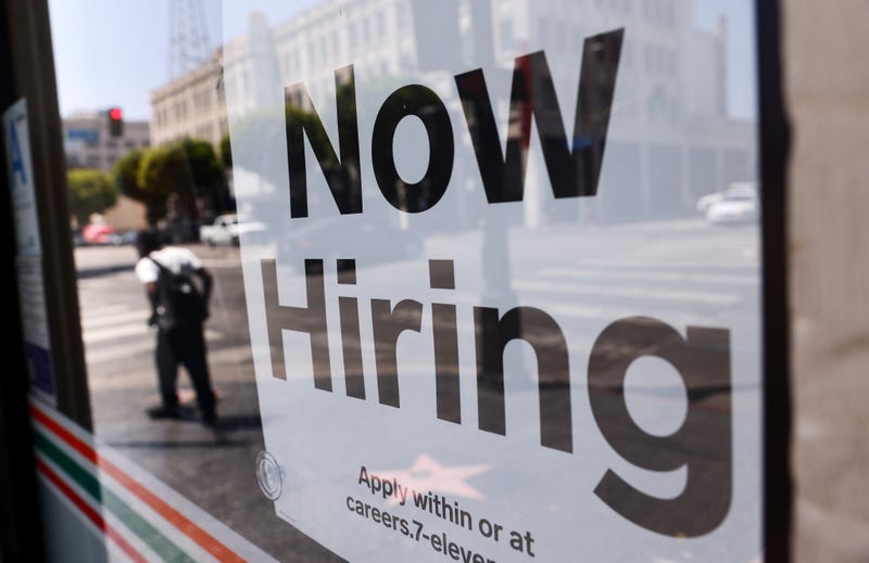 A store advertises for job openings