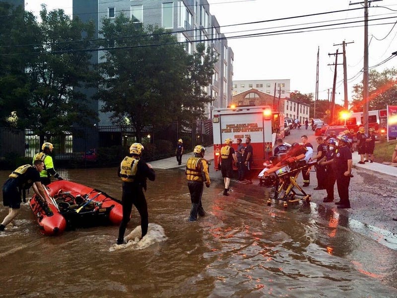 The Office of Emergency Management helping with flooding evacuations in Manayunk.