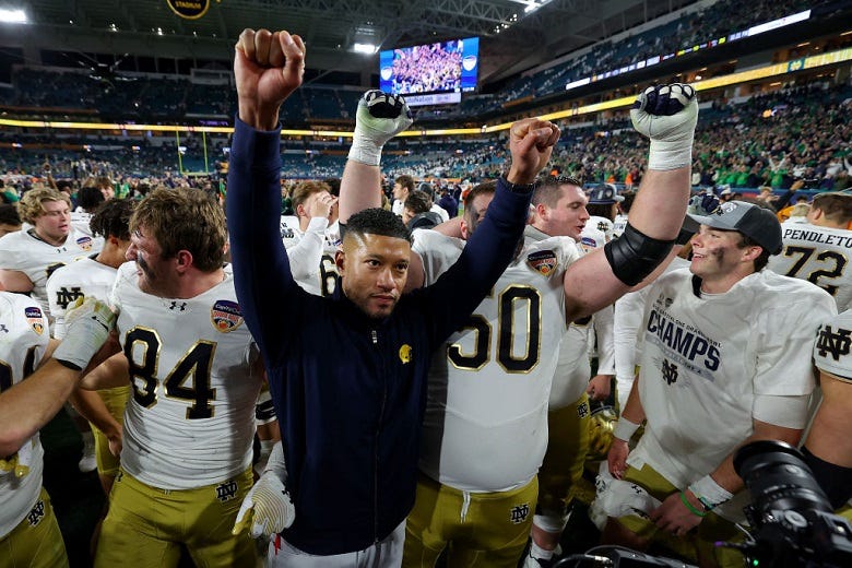 Notre Dame coach & player celebrating Orange Bowl win