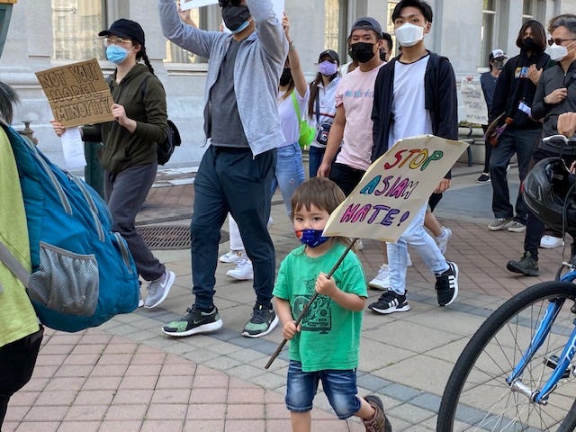 Bay Area residents gathered in Oakland to protest the recent violent attacks on Asian Americans.