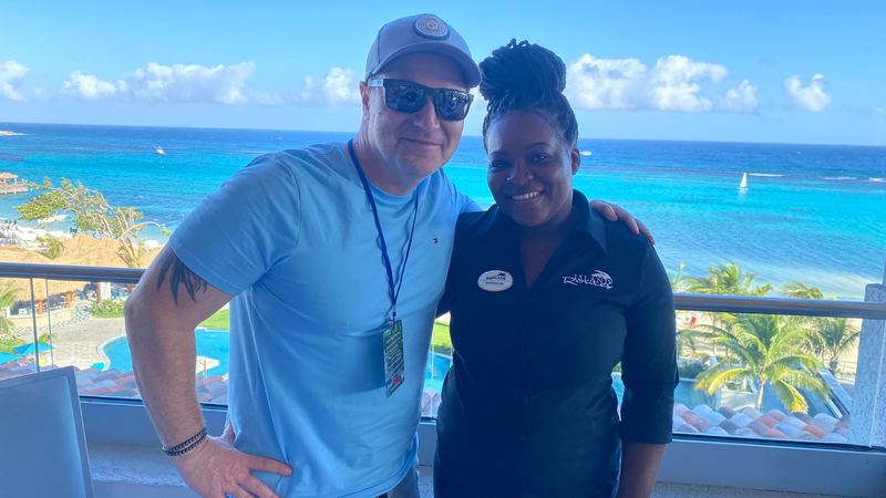 Bill Tafrow chats with Marsha Ashut, Regional Supervisor of Island Routes at Sandals® Dunn's River