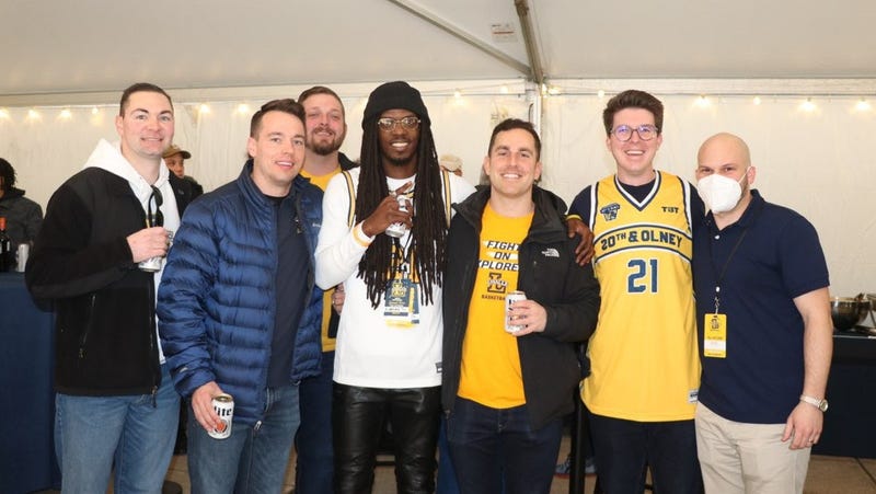 O'Donnell and Grove among a group of La Salle Explorers fans.