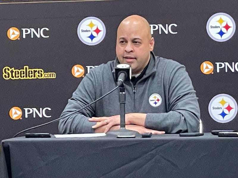 Omar Khan at podium