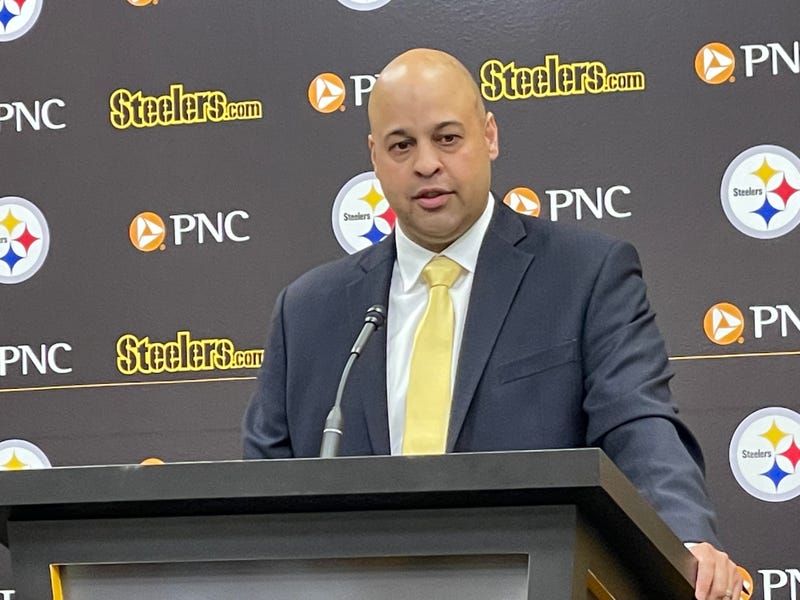 Omar Khan at podium
