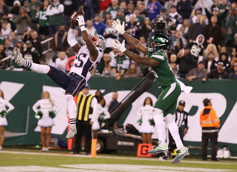Sam Darnold is intercepted by Terrence Brooks