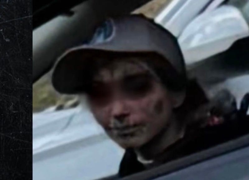 Woman in clown makeup in German Township, Fayette County