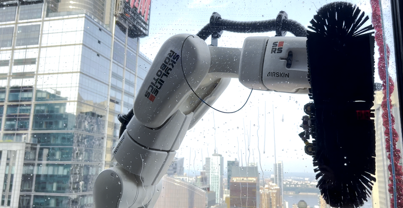 Ozmo's robotic arms "never miss a spot," its handlers said