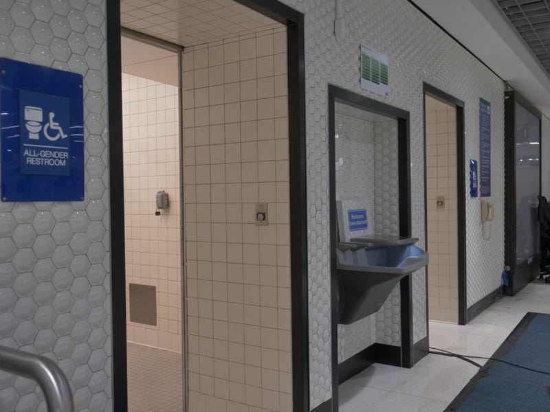 Users can't lock the restrooms, which now feature a tile entryway instead of a door.