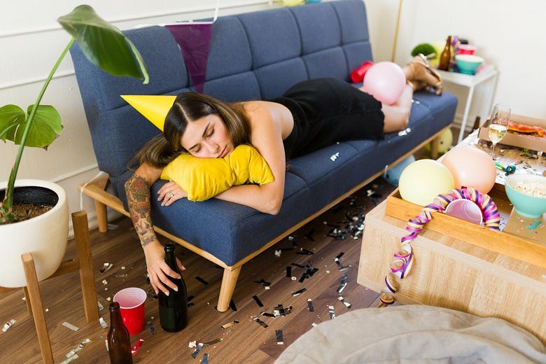 woman passed out on couch after party