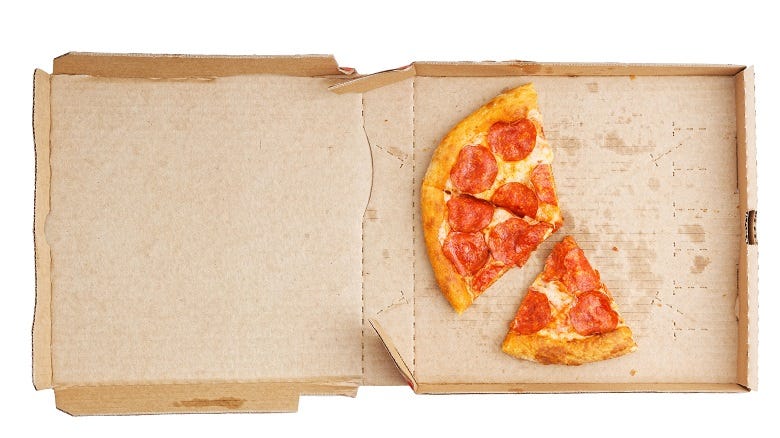 half eaten pizza in box