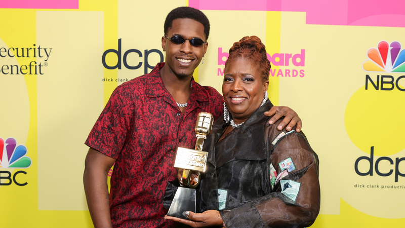 Obasi Jackson and Audrey Jackson, accept the Top Billboard 200 Album Award on behalf of Pop Smoke