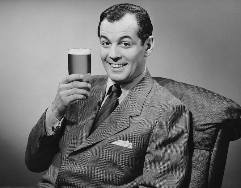 retro photo of man holding beer