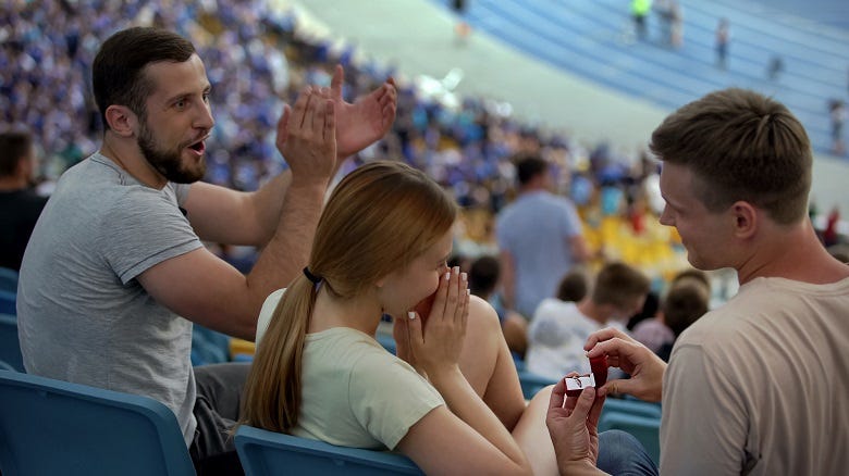 wedding proposal at a sporting event 