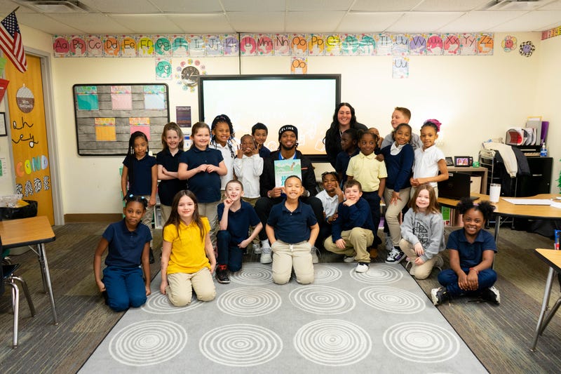 Damar Hamlin with the students of Propel Montour - All the scholars in the photos have photo releases, and their images can be published.