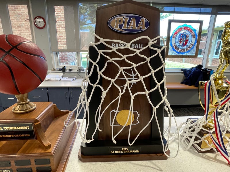 The Plymouth Whitemarsh girls basketball state championship trophy and net after it was cut down following their finals win Saturday in Hershey.