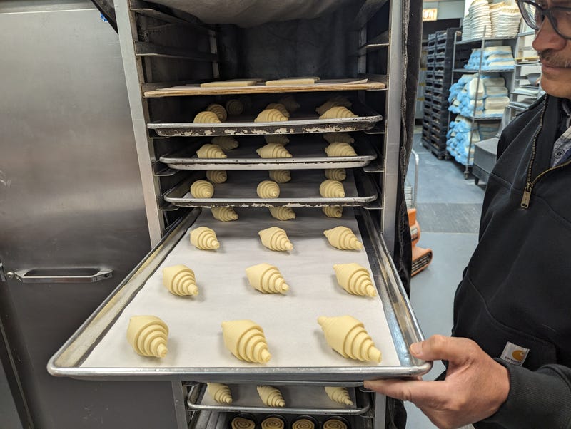 Precisely prepared croissants are ready to go in the oven at pHlour Bakery Cafe in Edgewater.