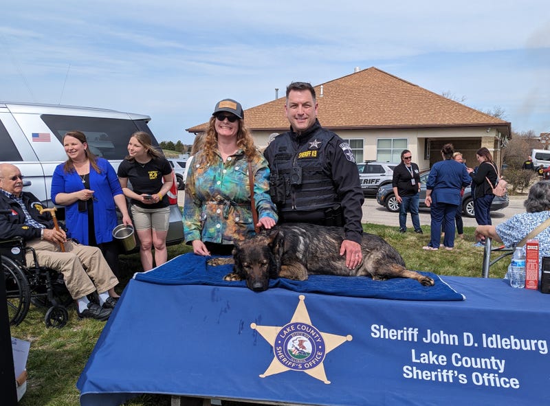 Lake County Sheriff's Deputy John Forlenza poses with K9 Dax