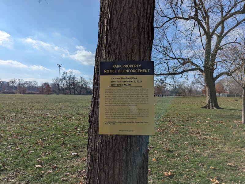 Notice posted on tree in Humboldt Park
