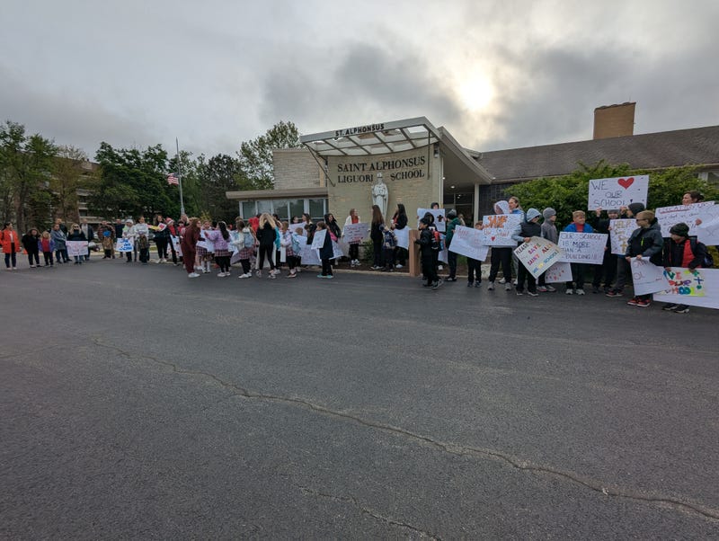 Parents and students protest planned closure of St. Alphonsus Liguori