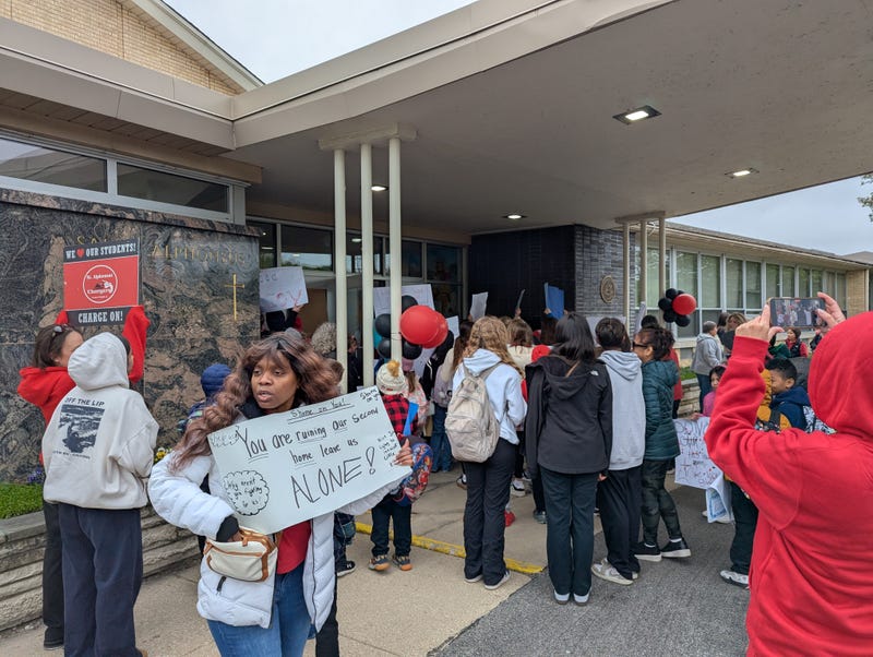Parents and students protest abrupt closure of Catholic school