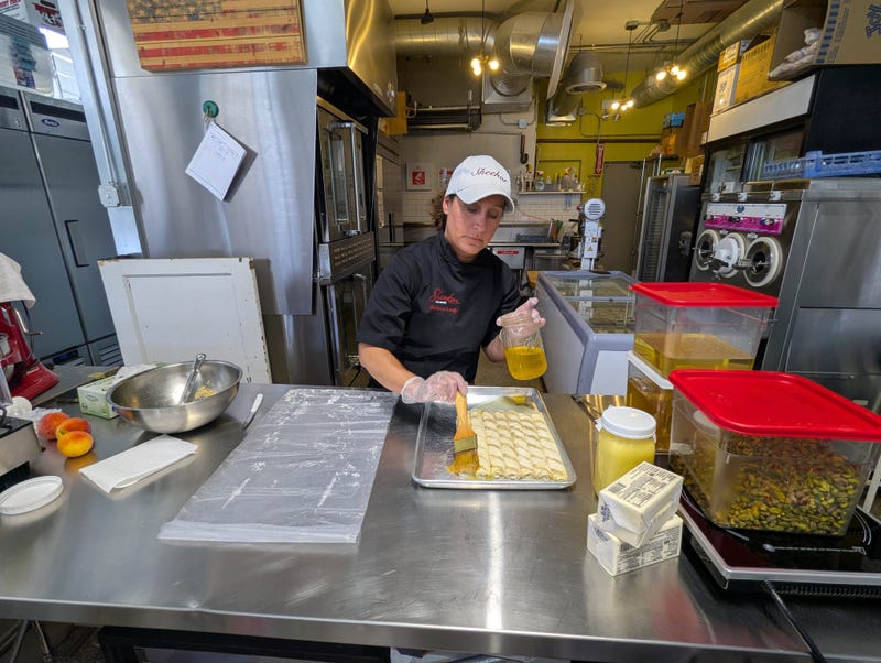 Owner Diane Joseph prepares baklava