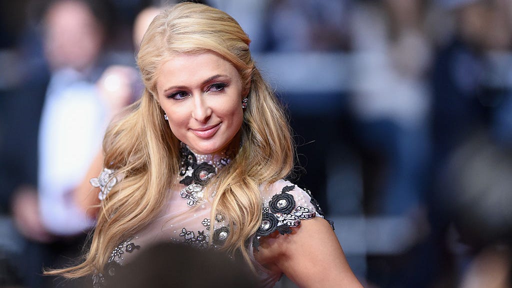 Is Paris Hilton expecting her first child with fiancé Carter Reum?