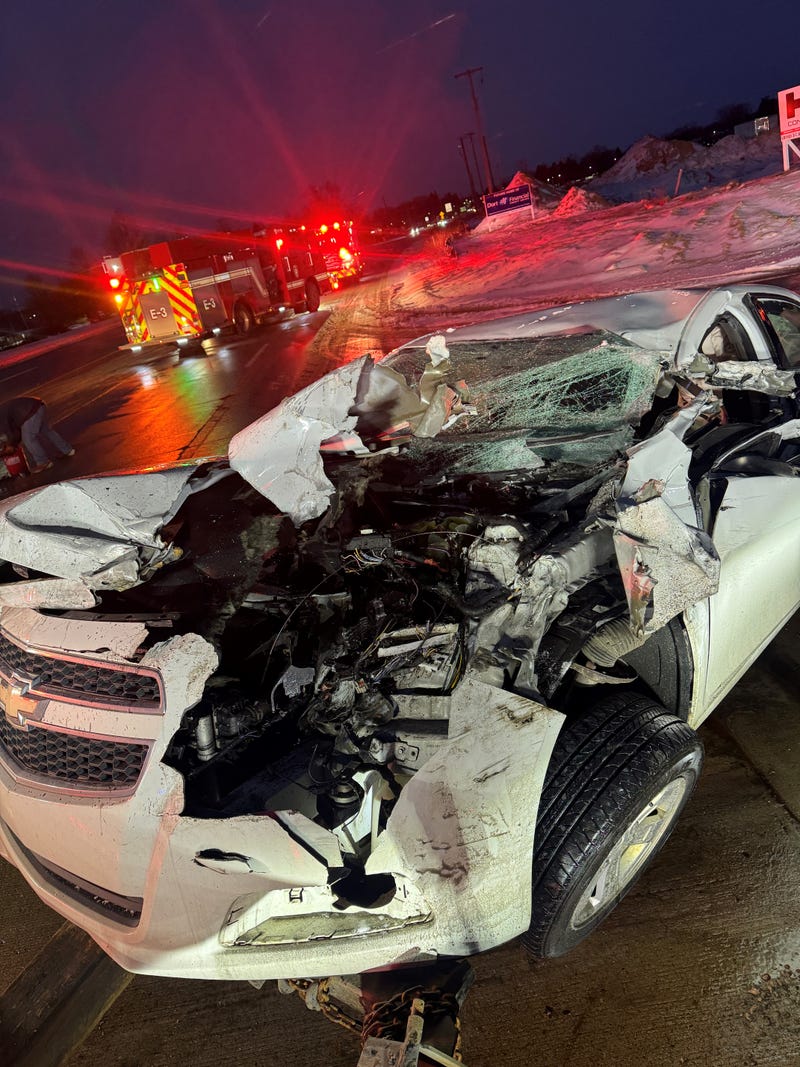 Car wreckage after crashing into semi