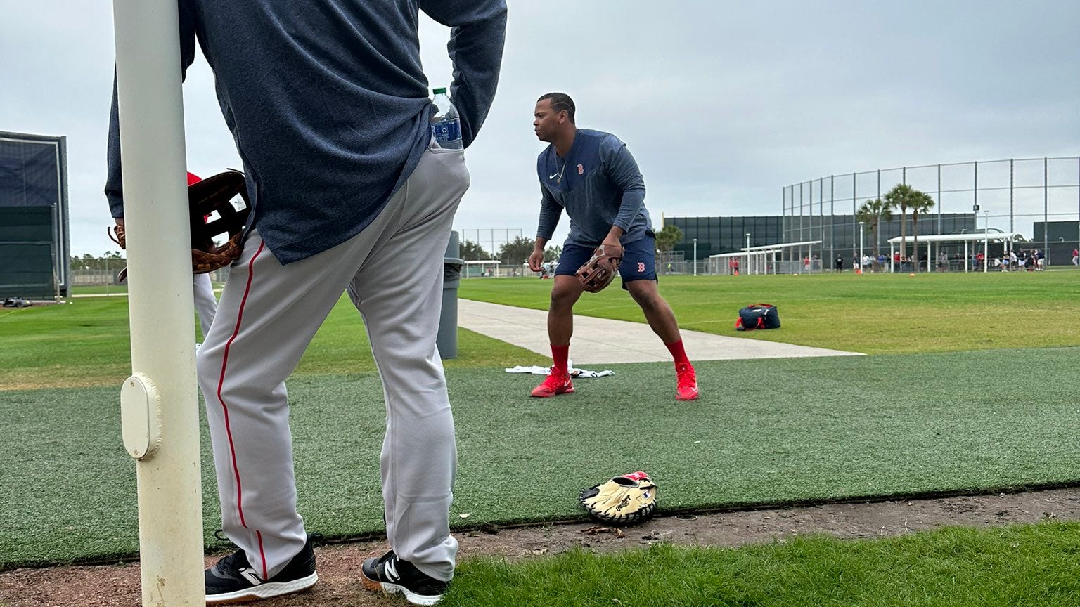 Dustin Pedroia, Rafael Devers bonded by glove