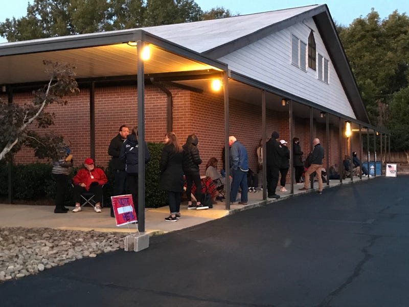 Voters line up outside the a precinct off Pelham Road around 6:30 a.m. on November 3