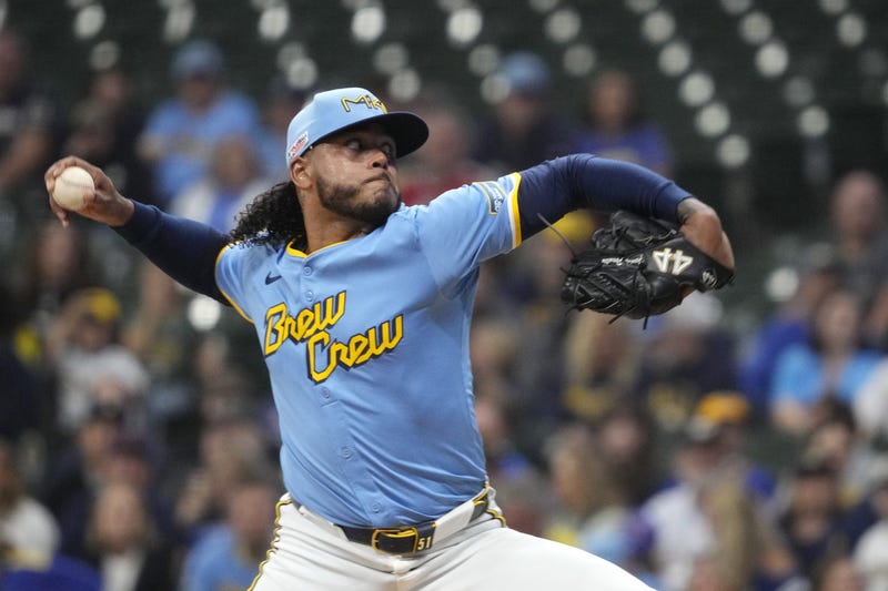 Jun 13, 2025; Milwaukee, Wisconsin, USA; Milwaukee Brewers pitcher Freddy Peralta (51) delivers a pitch against the St. Louis Cardinals in the first inning at American Family Field.