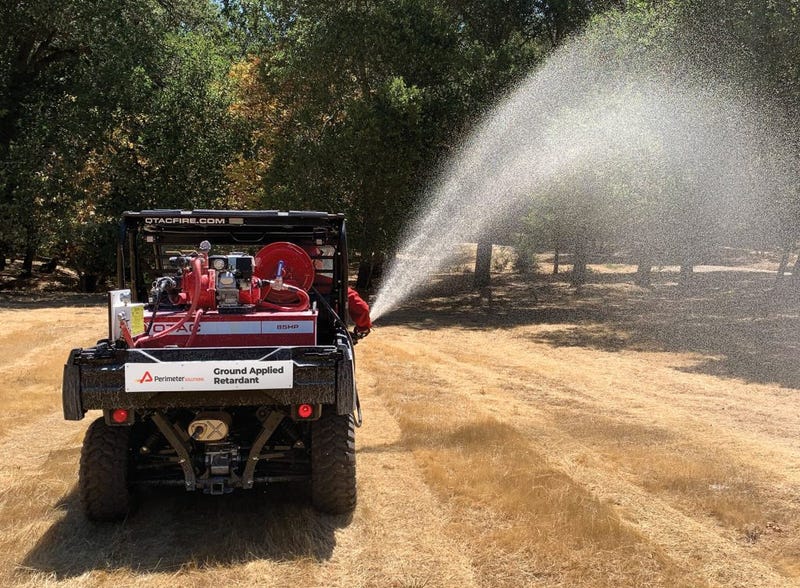 Phos-Chek Fortify being applied from an ATV