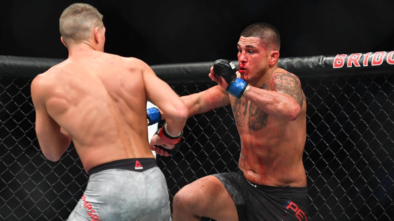 Anthony Pettis goes for a knockout punch on Stephen Thompson during UFC Fight Night 148 in Nashville.