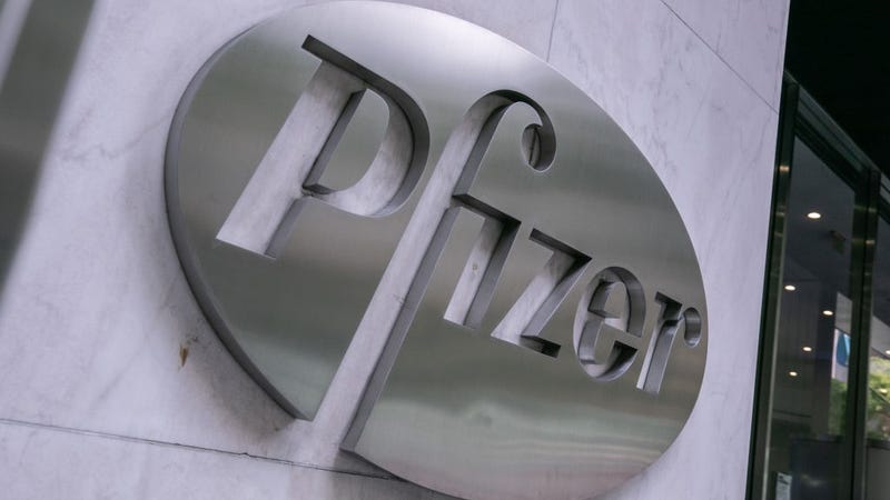 Pfizer Inc. signage is seen on July 22, 2020 in New York City. Pfizer and German biotechnology firm BioNTech have agreed to supply the U.S. government with 100 million doses of coronavirus vaccine under a $1.95 billion deal.