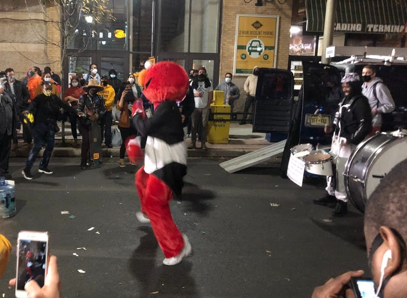 "Philly Elmo" leads the Positive Movement Entertainment drumline through Center City.