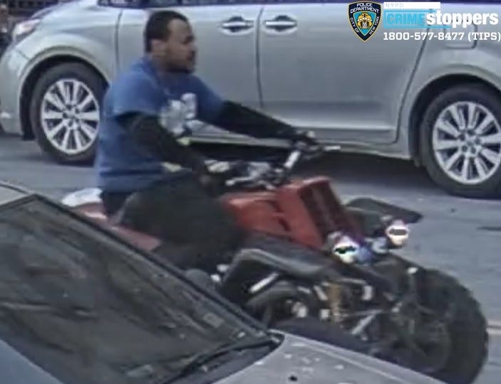 One of the suspects riding an ATV