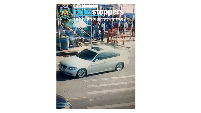 The silver BMW the suspect fled in
