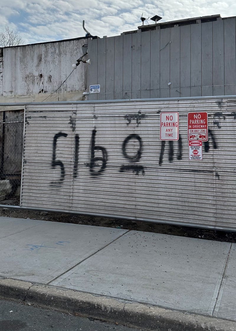 Man arrested for graffiti, violating Nassau mask ban