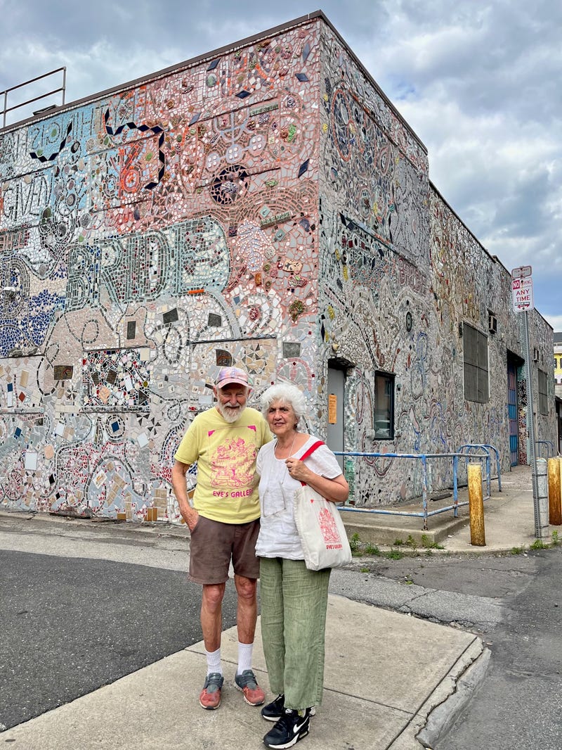 Isaiah Zagar and his wife, Julia, visiting the Painted Bride Mural.