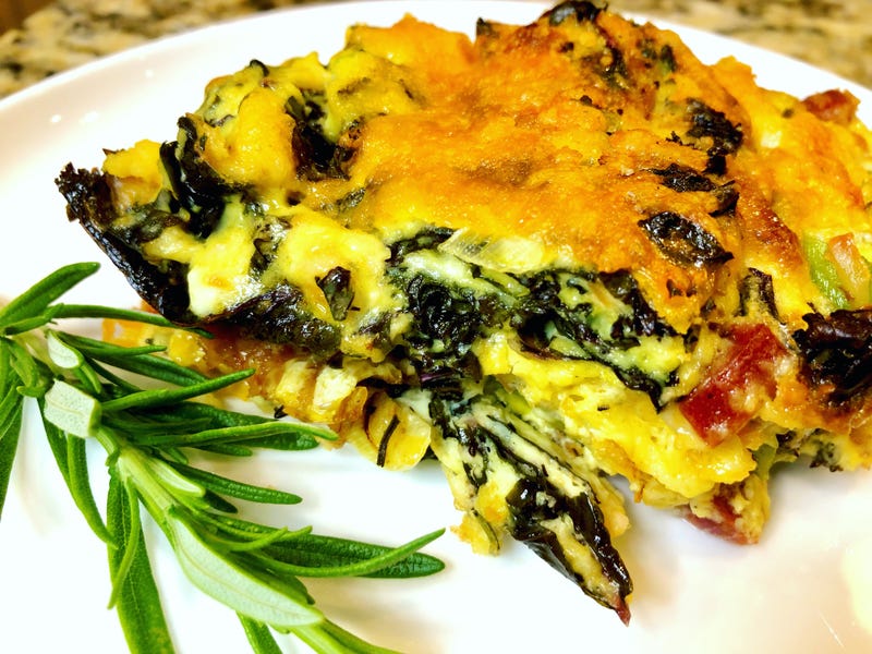 Bacon and Sausage Frittata with Purple Kale, Cheeses and Herbs
