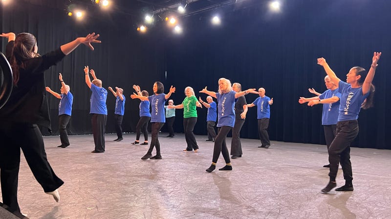 Participants in the Dancing with Parkinson's program take the stage at the Joffrey Ballet.
