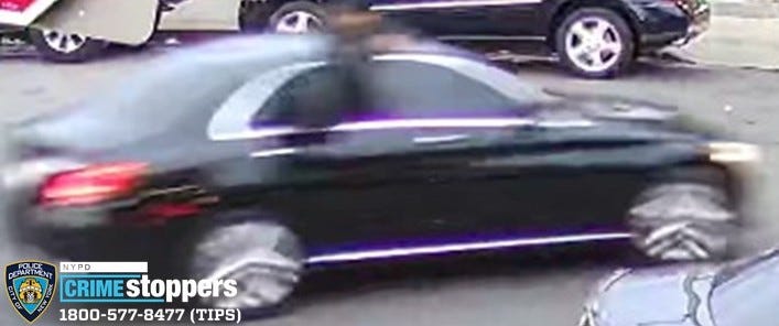 Police are searching for a black Mercedes sedan in the shooting
