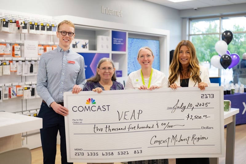 As part of the ribbon cutting for its 16th Twin Cities Xfinity store in Richfield, Comcast made good on its mission to invest in the communities it serves, donating $2500 to Veap, the Twin Cities’ largest food pantry.