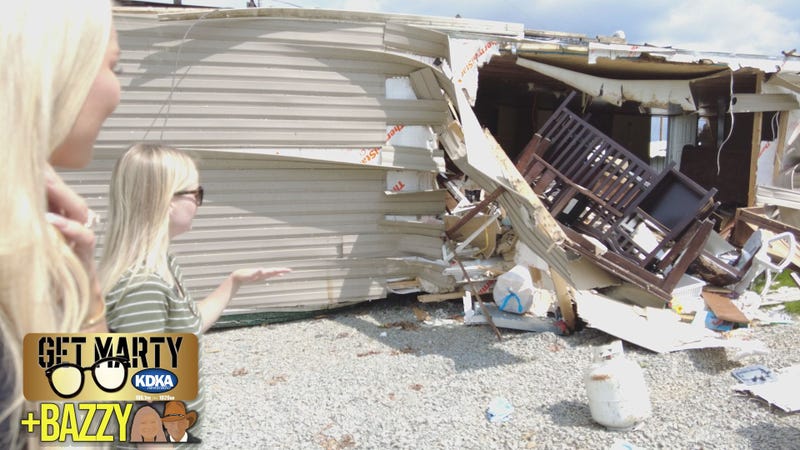 Caitlin shows Arianna destroyed home