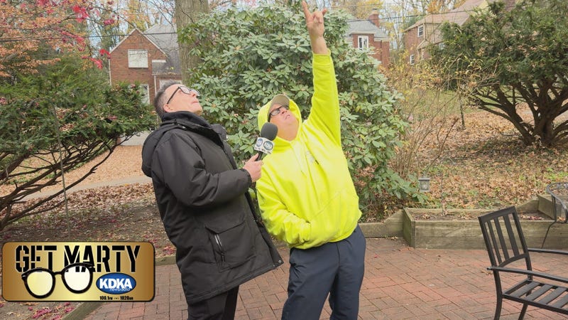 Carlos McClintock shows Marty Griffin what needs to be done at Julia's home.