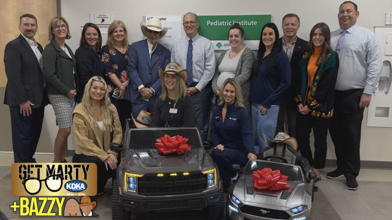 Shults Ford and AHN Wexford teams with Power Wheels donation.