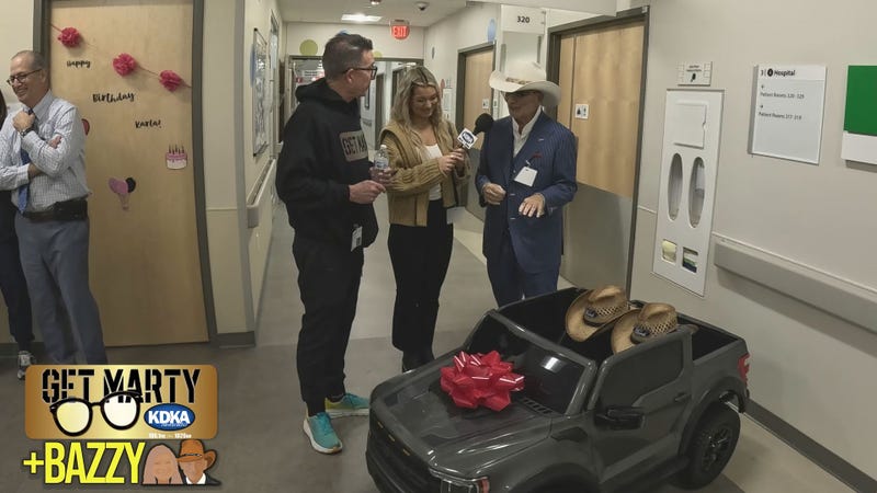 Richard Bazzy tells his daughter Arianna and Marty why its important to support the community.