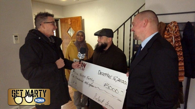 The Perez Family finds out they're receiving $5,000 from Levin's Furniture For Families program