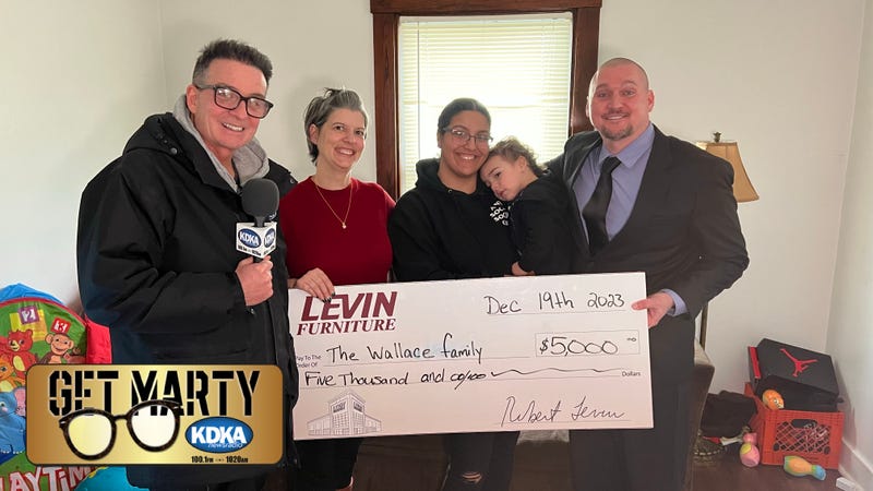 Lisa Reihl helps surprise her daughter Mikhal Wallace with Levin's Furniture For Families.